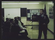 Photograph of Colonel Butler speaking to Air Force ROTC cadets